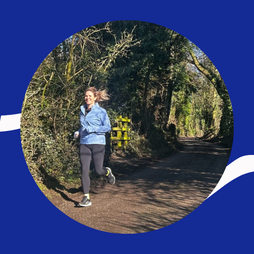 Suse is running along a sunny path.